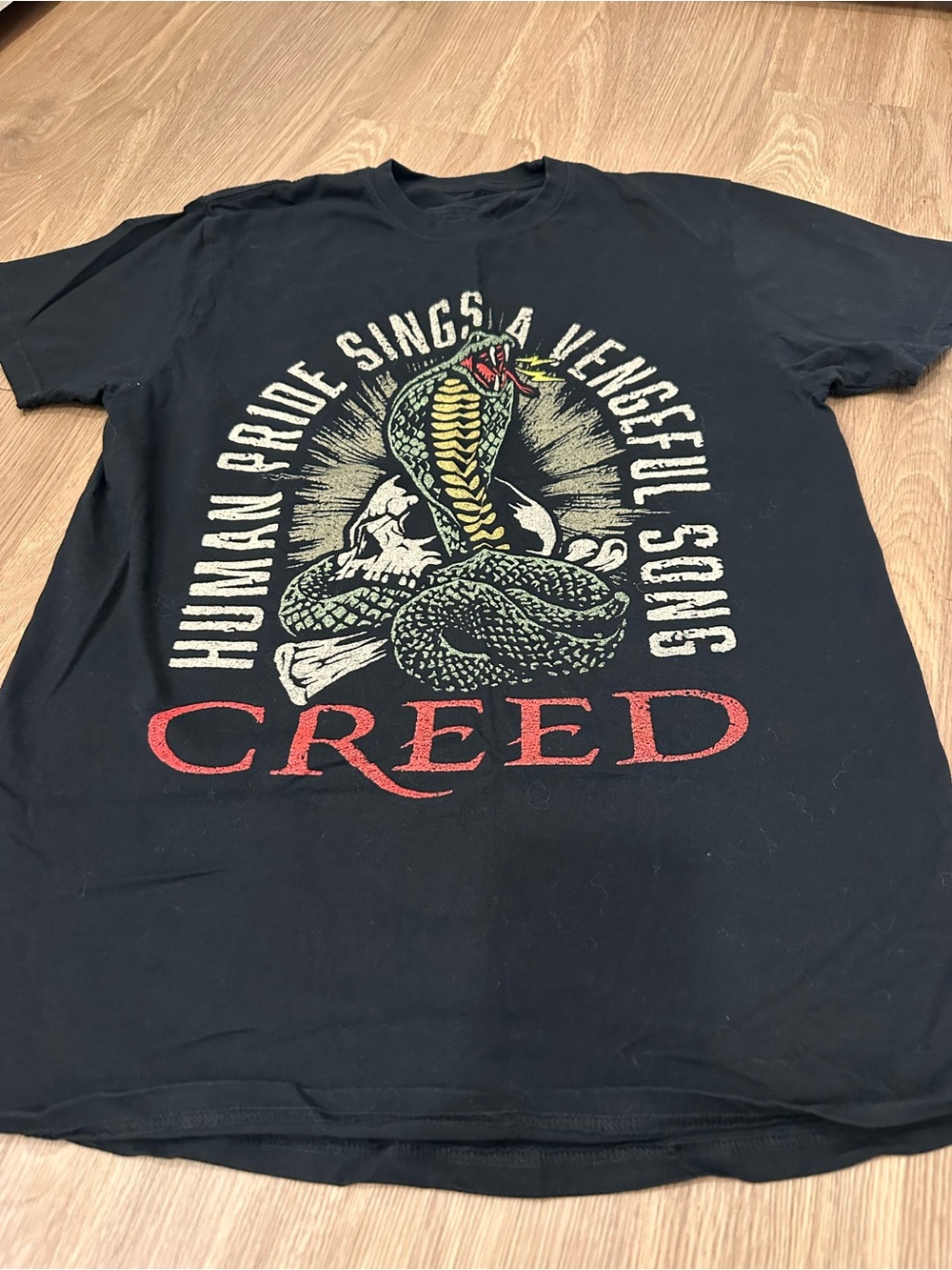 Creed Black Short Sleeve Tee with Red Logo and Green Snake Graphic